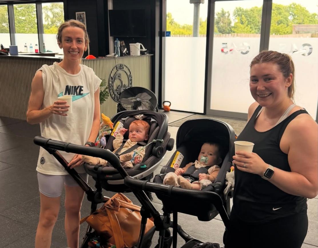 Two mums with their babies in prams after a G45 Mums class